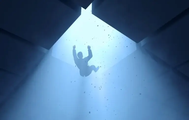 man falling into a hole